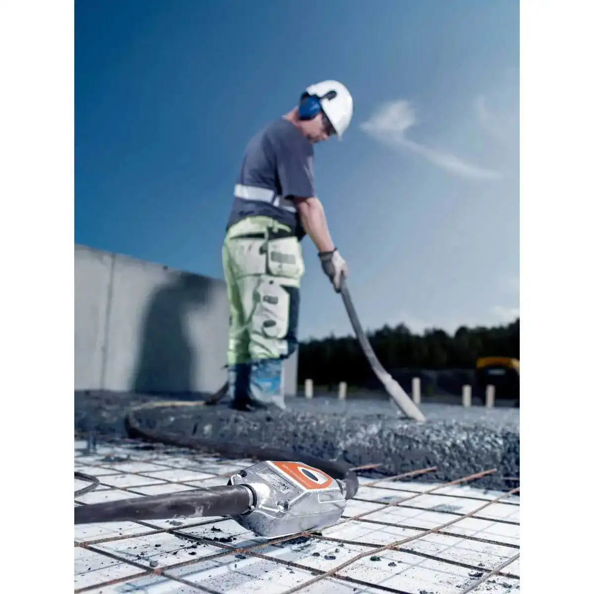 Husqvarna smart concrete vibrator in use on slab