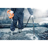 Husqvarna AME1600 Concrete Vibrator Power Unit in use on slab