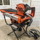 Connecting Hose to iQTS244 Tile Saw for Job Site Vacuum