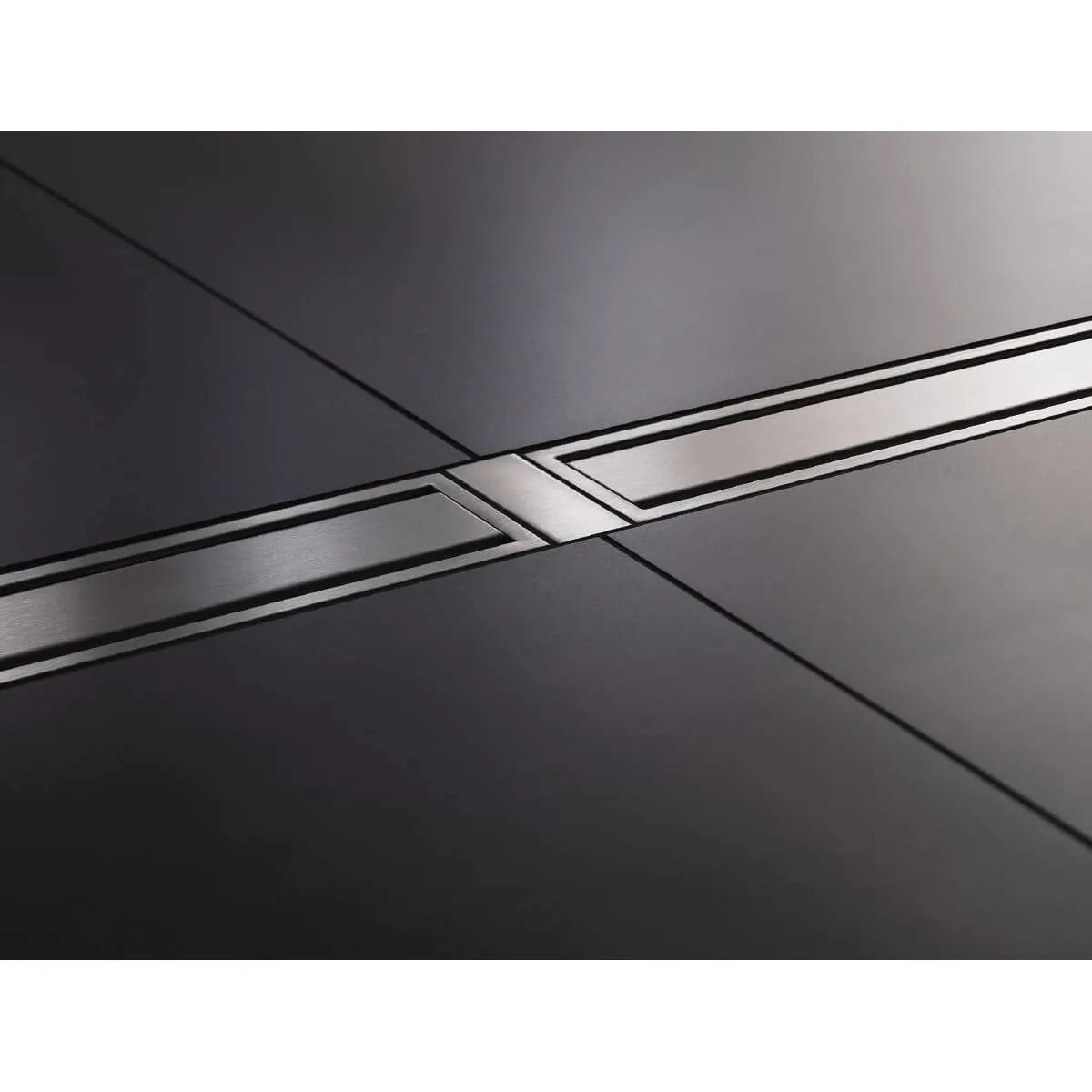 Schluter KERDI-LINE-FC is a stainless steel cover plate where multiple drains are installed end-to end