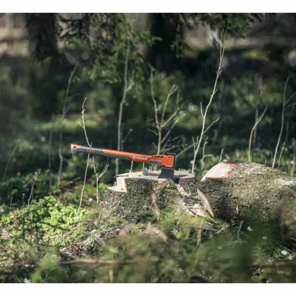 husqvarna axe cutting wood