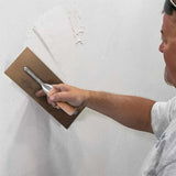 Marshalltown Curry-Style Trowels in use on drywall