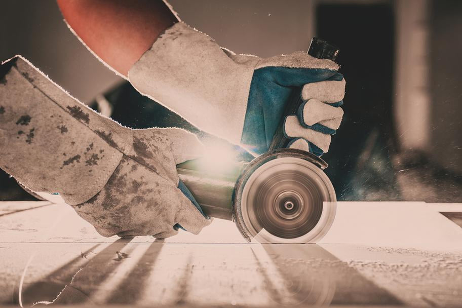 gloved hand of a construction worker