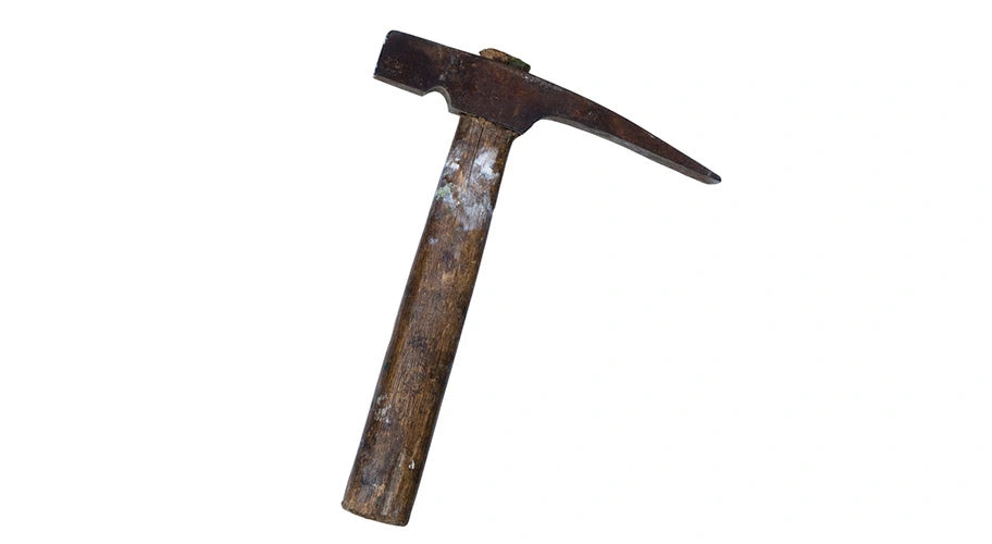 old mason's hammer on white