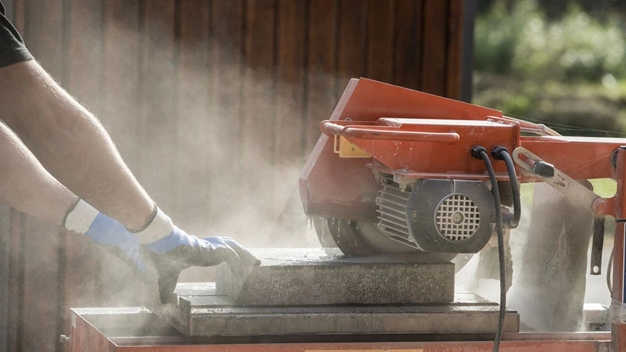 person working with a saw